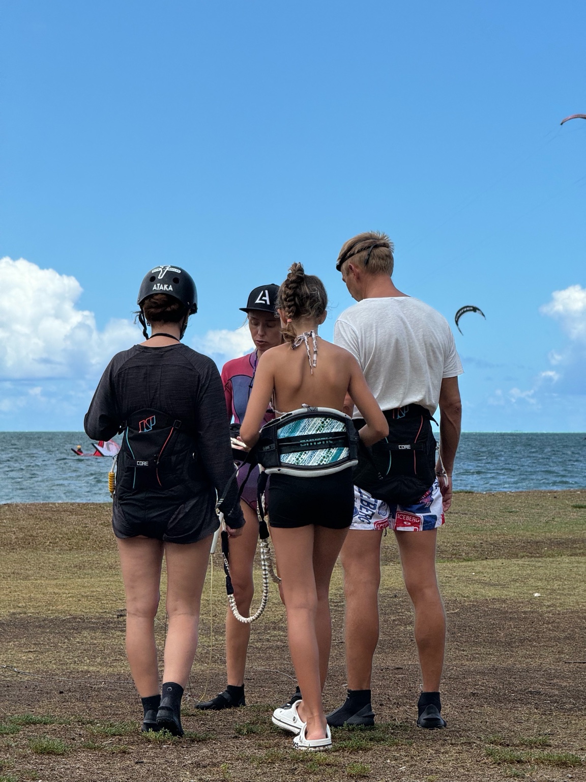 Kitesurfer carving in turquoise lagoon, Mauritius